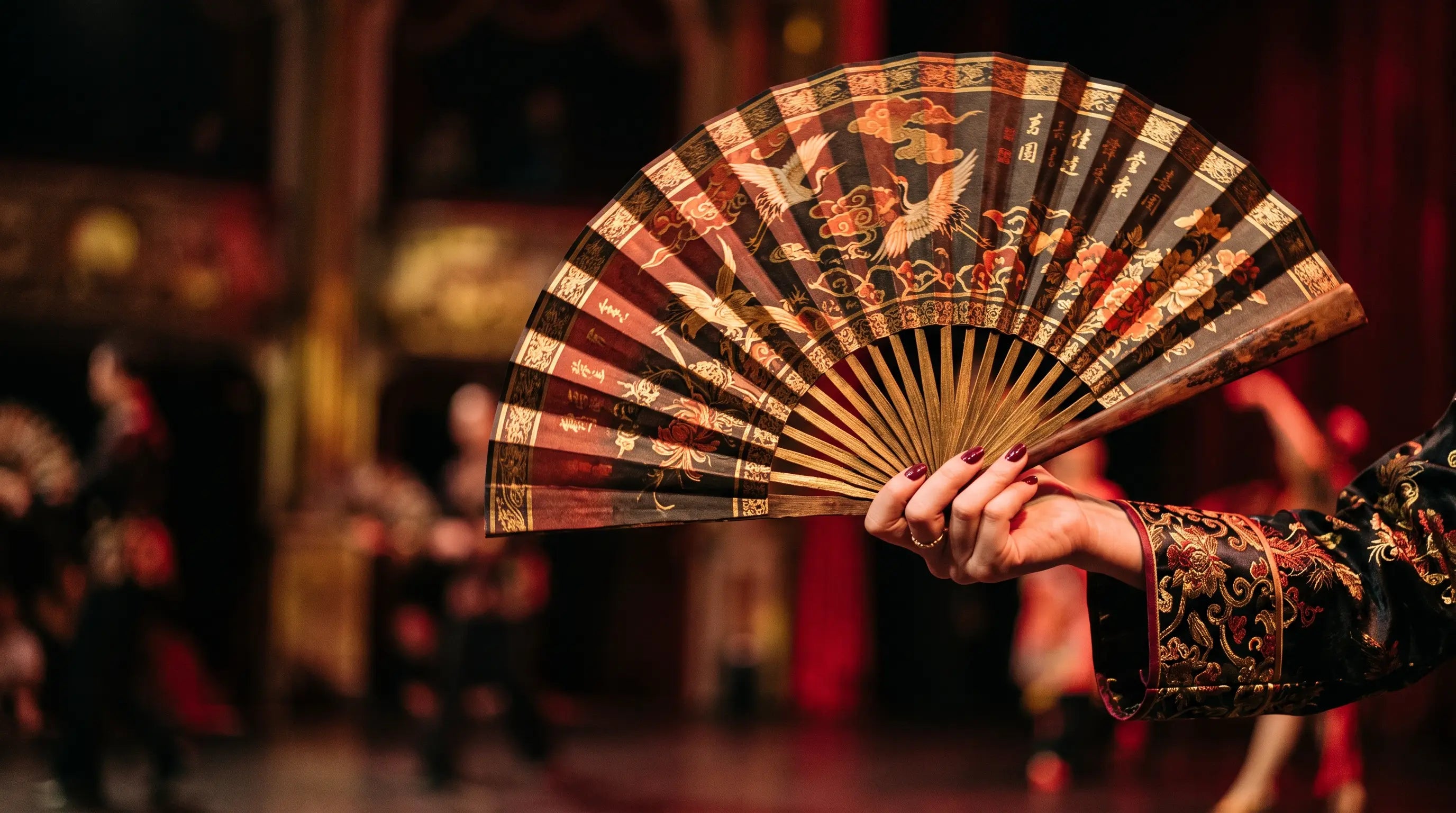 Cultural Significance of Folding Fans in Performances