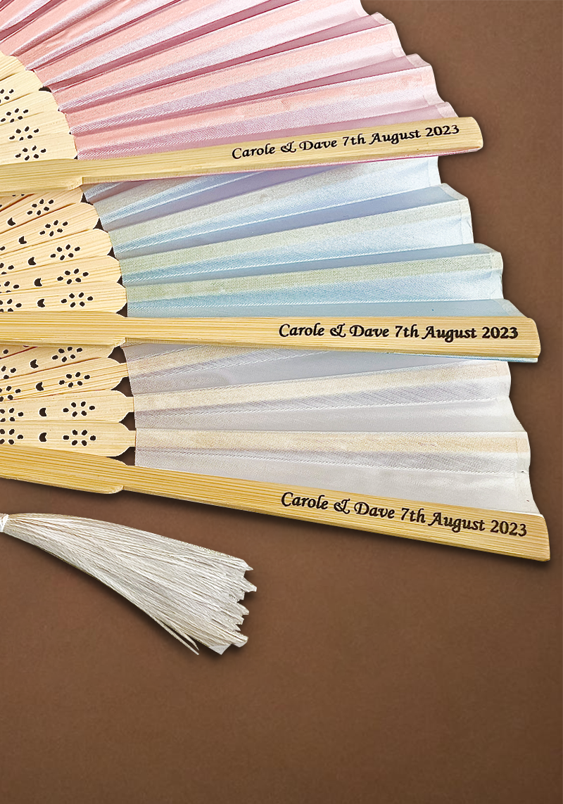 A personalized hand fan designed for weddings, featuring elegant patterns and custom text for a unique touch.