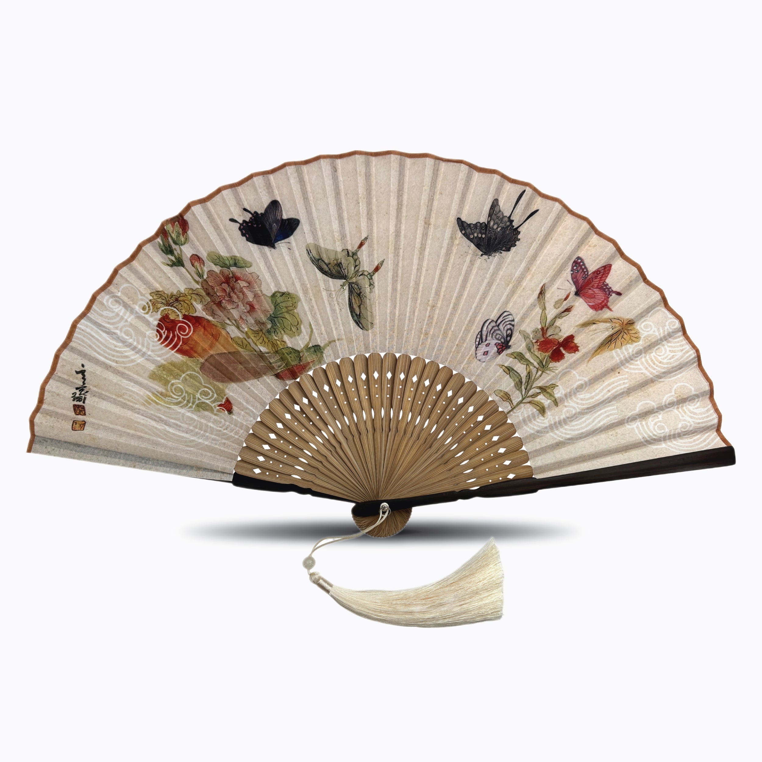 Vintage silk folding hand fan featuring colorful butterflies and floral artwork on a cream background, with natural bamboo ribs and a matching cream tassel