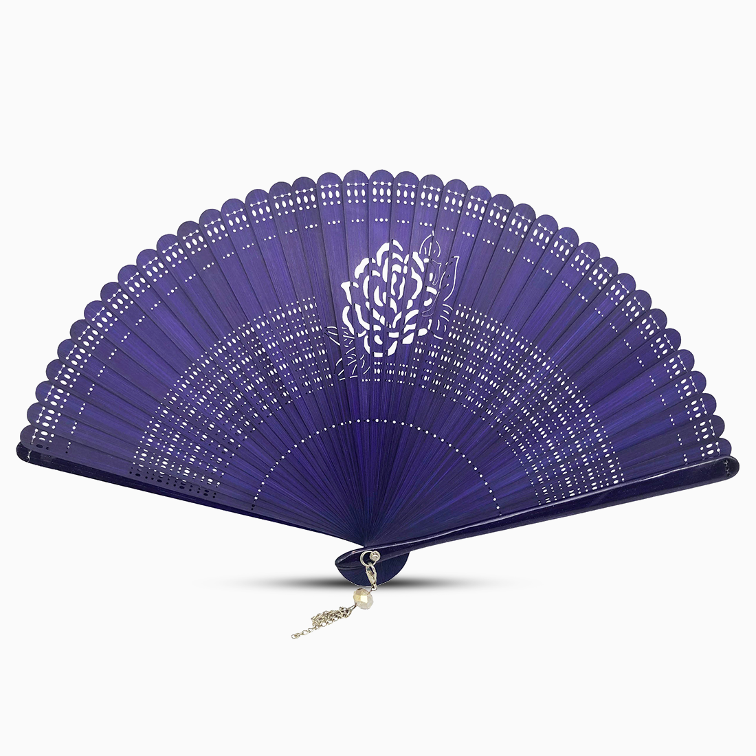 A navy blue wooden hand fan with a rose flower cut design and a decorative tassel attached.