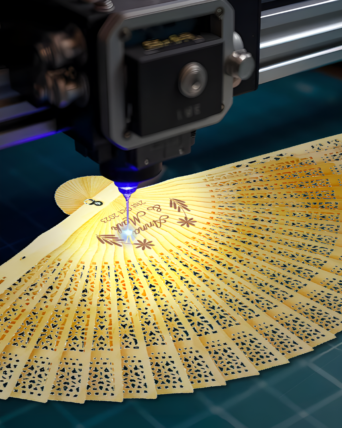 A 3D printer creating a hand fan, showcasing the intricate design and layers being built up during the printing process.