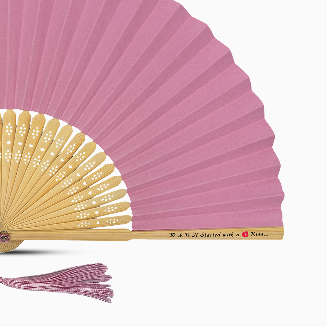 A Soft Pink solid color hand fan, featuring a personal message printed on main rib.