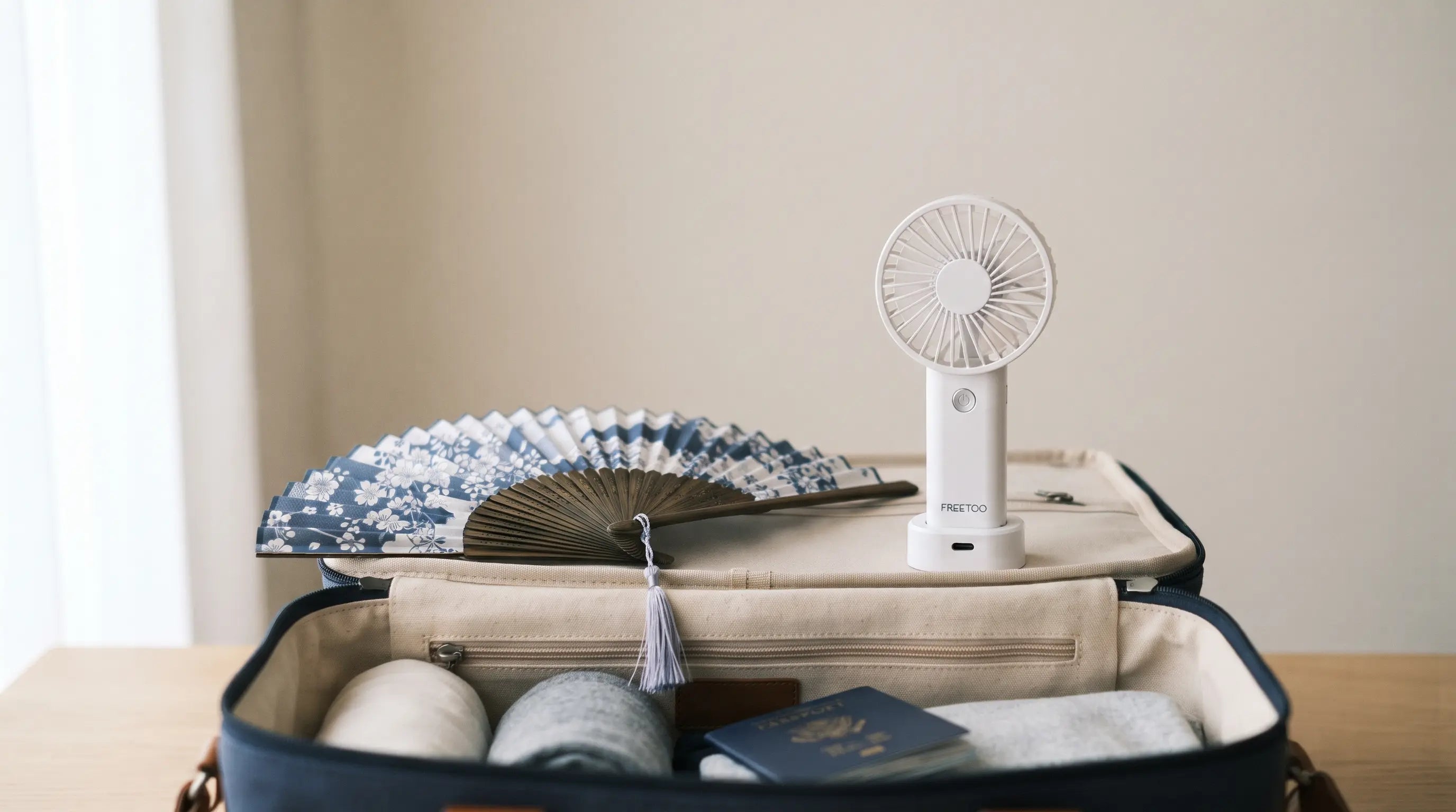 Folding Hand Fans vs Portable Battery Fans for Travel