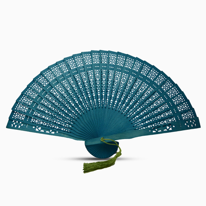 A vibrant Dark Green fan made of color dyed wood, complete with a decorative tassel for added elegance.