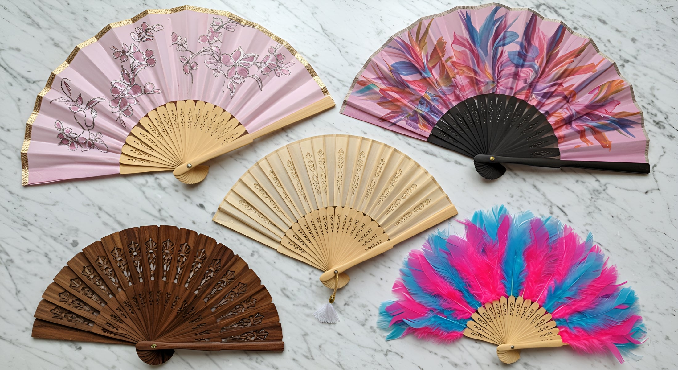 Four hand fans displayed, each featuring unique designs and colors, showcasing a variety of styles and patterns.