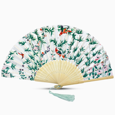 A white hand fan featuring a floral design and birds, showcasing intricate artwork and vibrant colors.