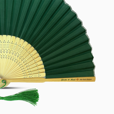 A Emerald Green solid color hand fan, featuring a personal message printed  on main rib.