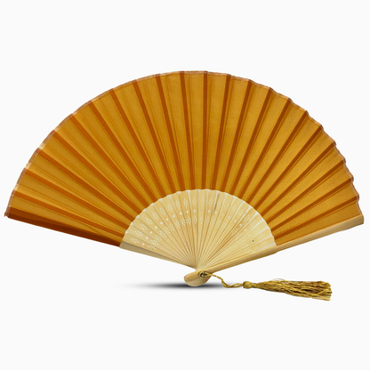 A Dark Gold Color fabric fan with a tassel, showcasing a solid color design.