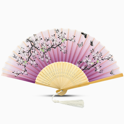 A Purple hand fan with a wooden rib, featuring a Garden Blossom design.