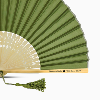 A Olive Green solid color hand fan, featuring a personal message printed  on main rib.