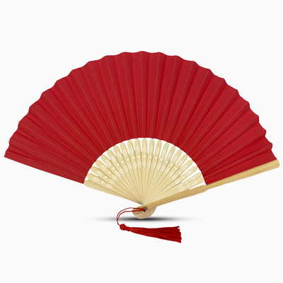A red paper folding fan featuring a tassel, elegantly designed in a solid color.