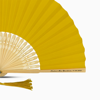 A School Bus Yellow  color hand fan, featuring a personal message printed  on main rib.
