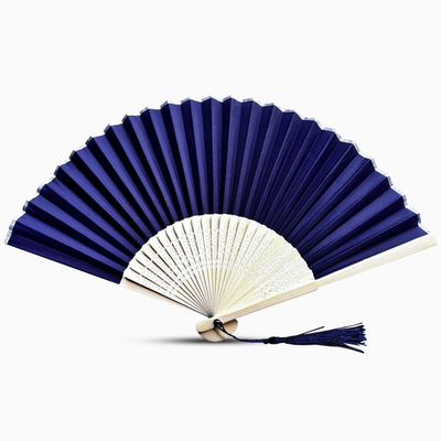 Blue and white hand fan on a white background