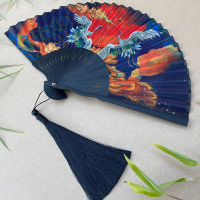 Decorative fan with colorful design on a light background
